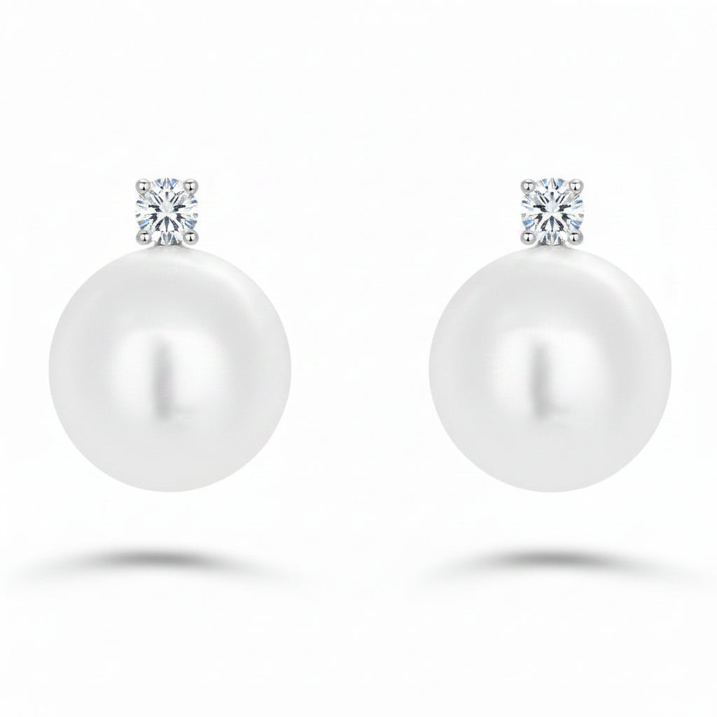 14k gold stud earrings with 8.5 mm pearls and 0.04 cts diamonds