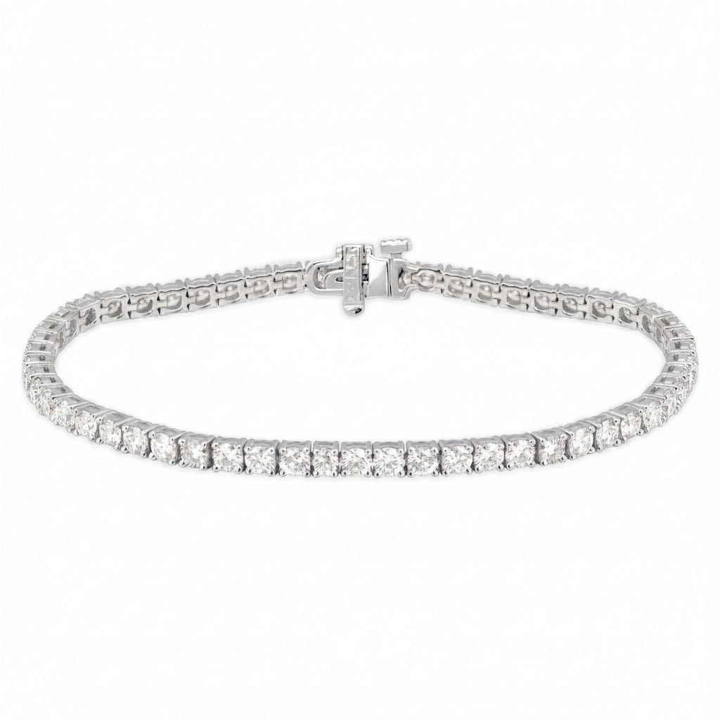 14k white gold tennis bracelet with 64 round brilliant diamonds totaling 2.67 cts