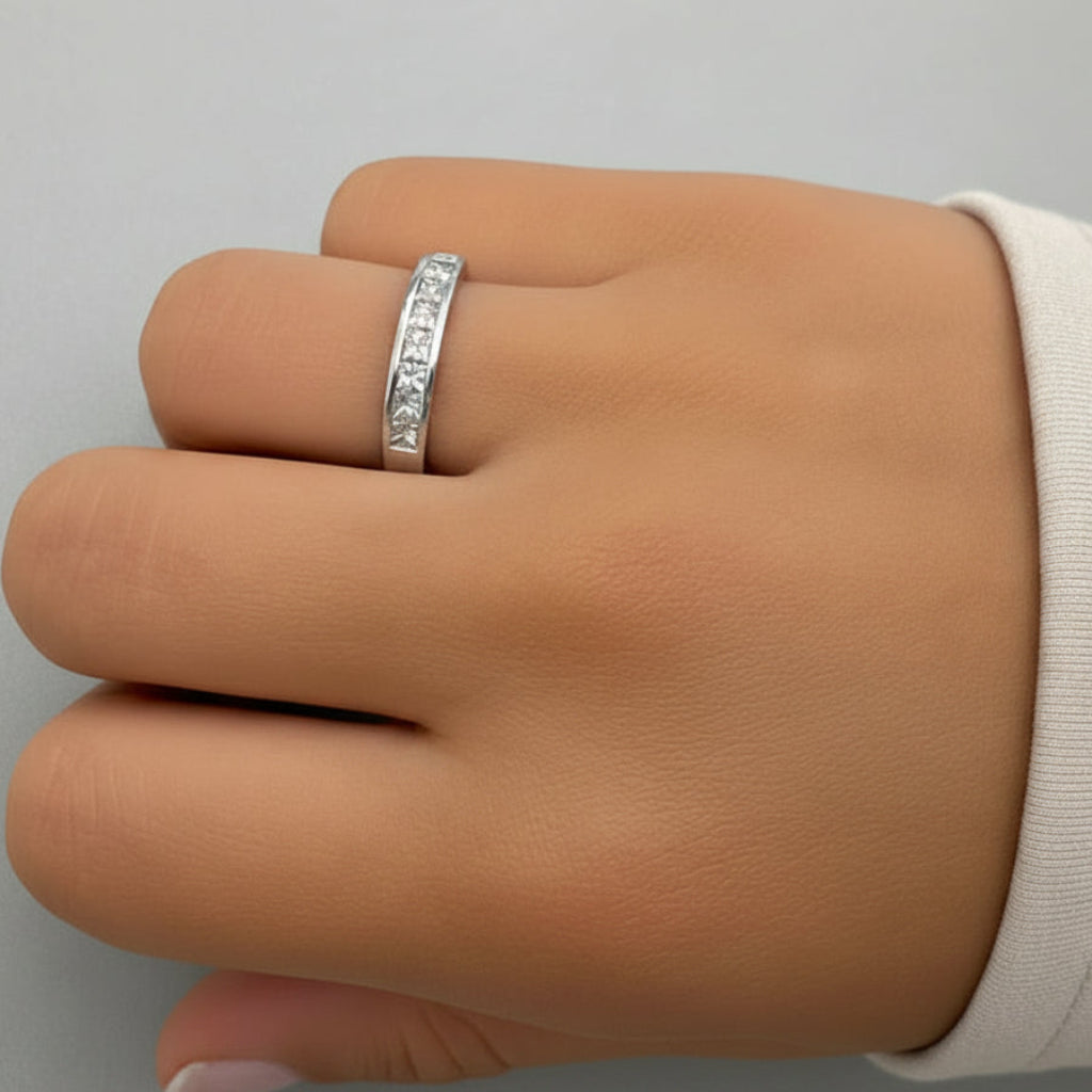 14k white gold half-band ring with eight channel-set diamonds totaling 0.74 cts