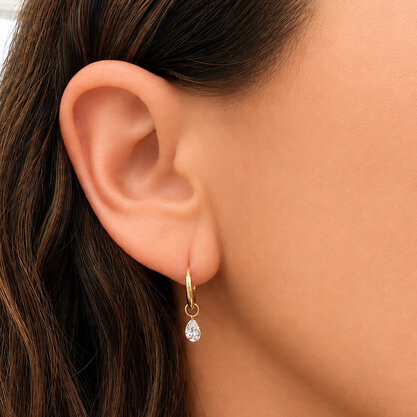 model wearing 14k yellow gold lab diamond mini hoop earrings