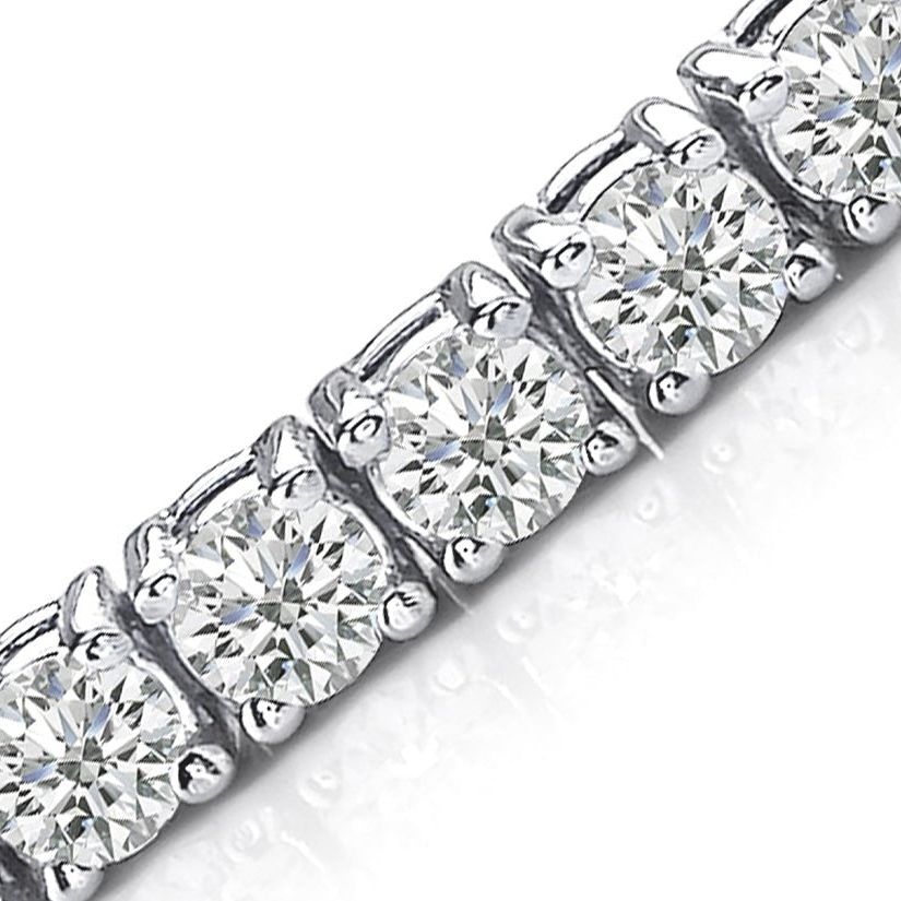 18k white gold tennis bracelet with 42 round brilliant diamonds totaling 6.40 cts