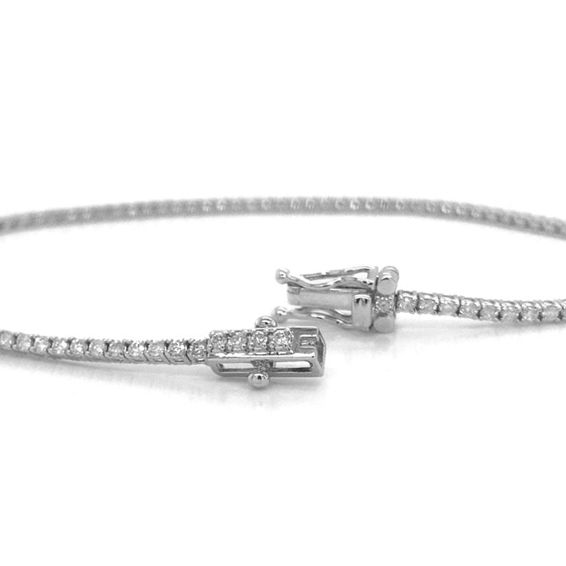 18k white gold tennis bracelet with 79 round brilliant diamonds totaling 1.50 cts