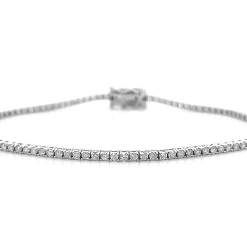 18k white gold tennis bracelet with 79 round brilliant diamonds totaling 1.50 cts