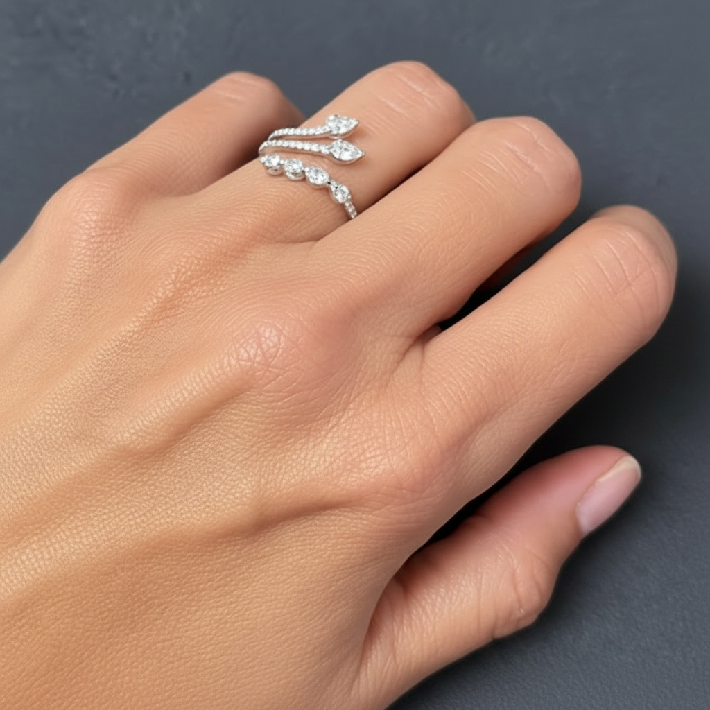 model wearing 18k white gold open baguette diamond ring on finger