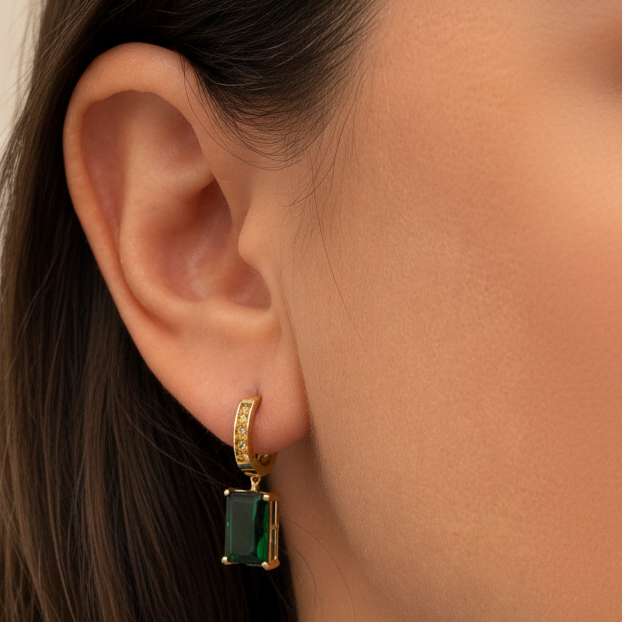close up of green tourmaline emerald cut earrings detail
