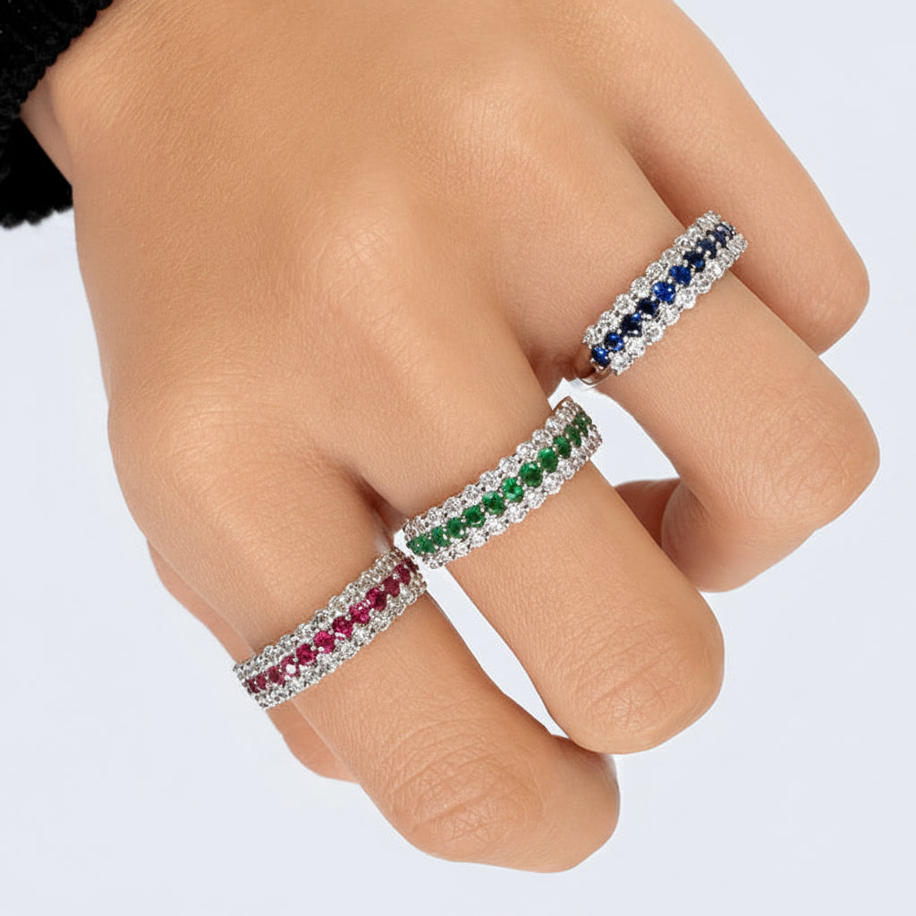 18k gold half band ring with emeralds and round brilliant diamonds by Diamond Tales
