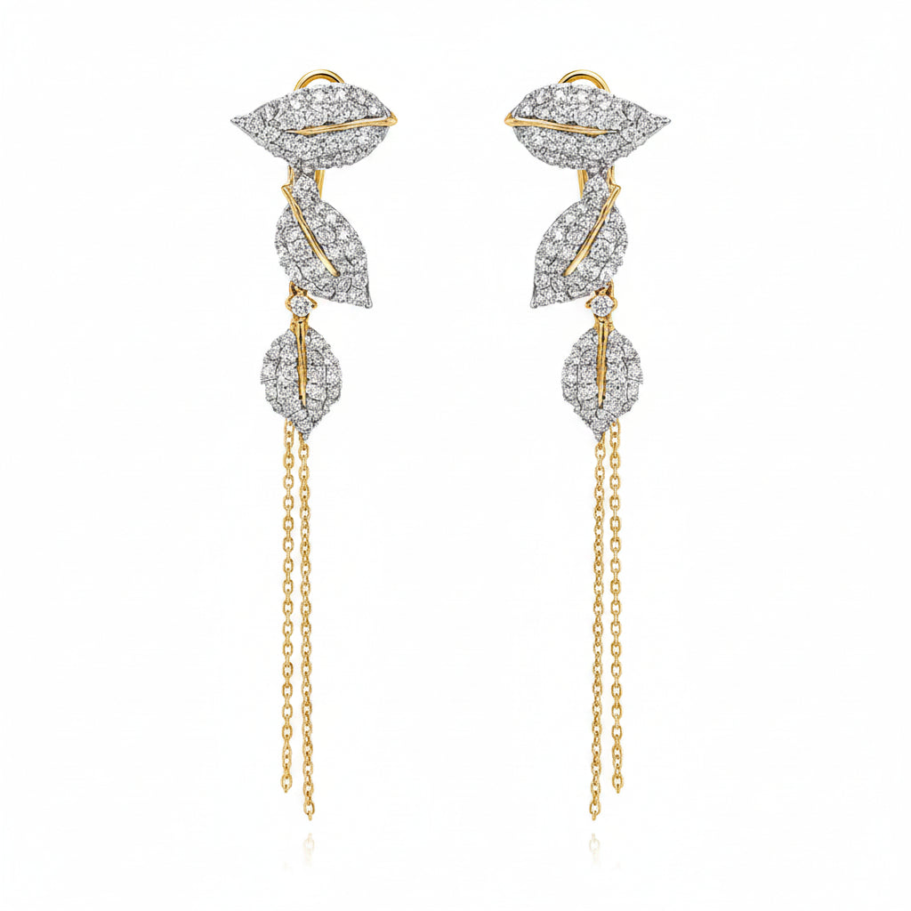 Leaf-shape drop earrings in 18k yellow gold with diamond pavé and long chain by Diamond Tales
