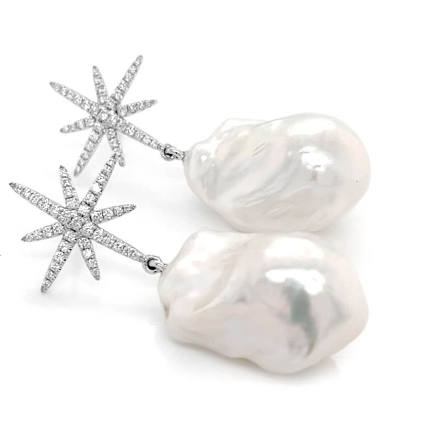 14k gold drop earrings with baroque pearls and star-shaped diamond accents