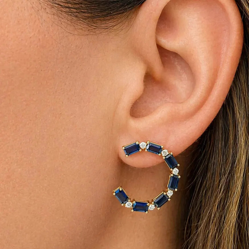 18k gold open-circle stud earrings with blue sapphires and diamond halo