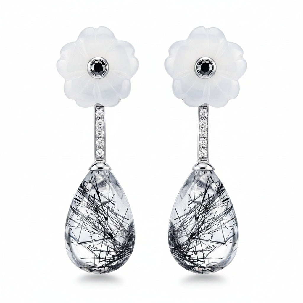 18k white gold drop earrings with carved white onyx, rutilated quartz, and diamond accents