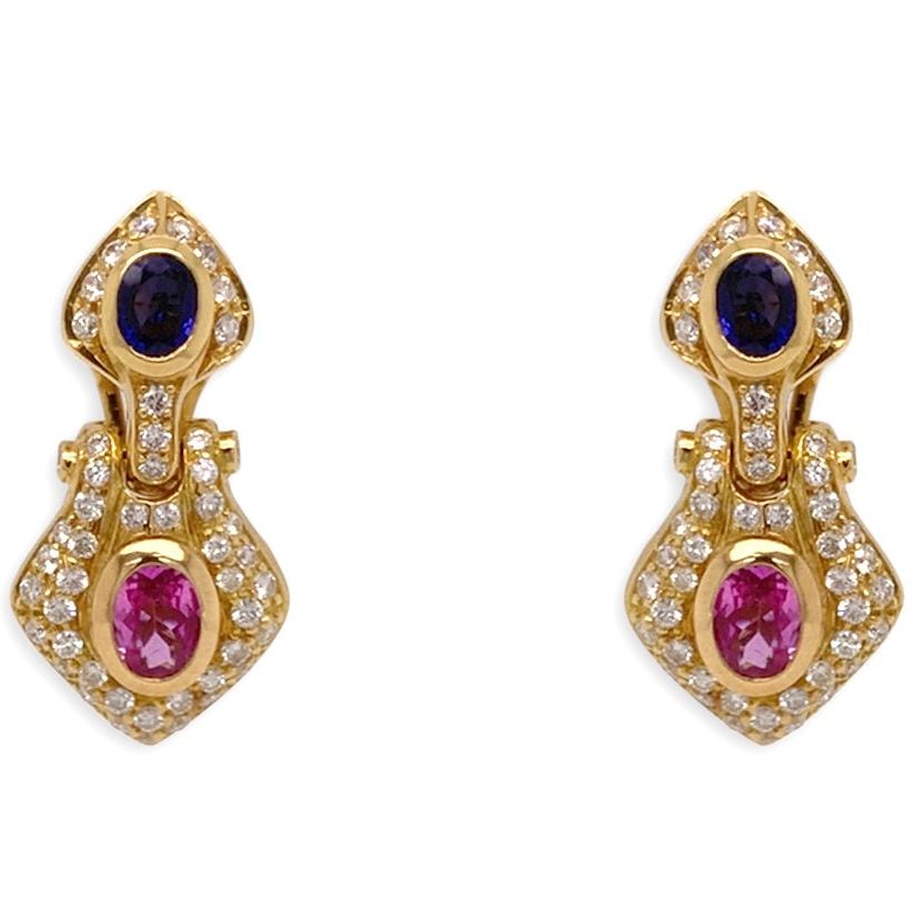 18k gold earrings with sapphire centers in a halo of diamond accents