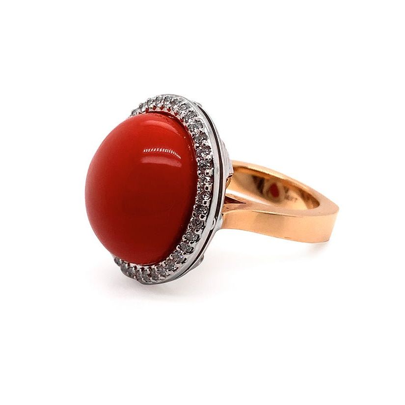 18k gold ring with coral cabochon and round diamond accents