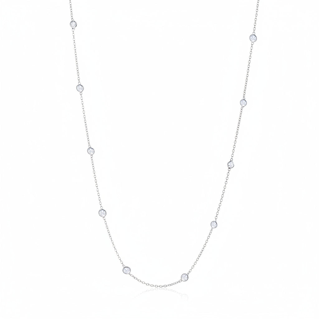 18k white gold Diamond by the Yard necklace with 17 bezel‑set diamonds on a 21.5‑inch chain