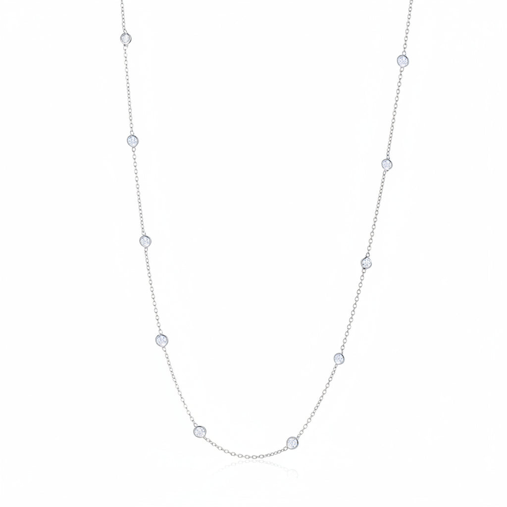 18k gold diamond-by-the-yard necklace with spaced bezel-set diamonds