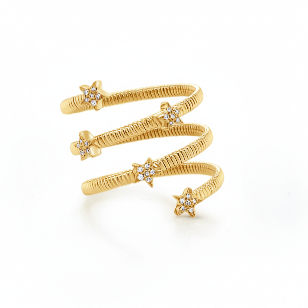 18k yellow gold spiral ring with diamond star details by Diamond Tales