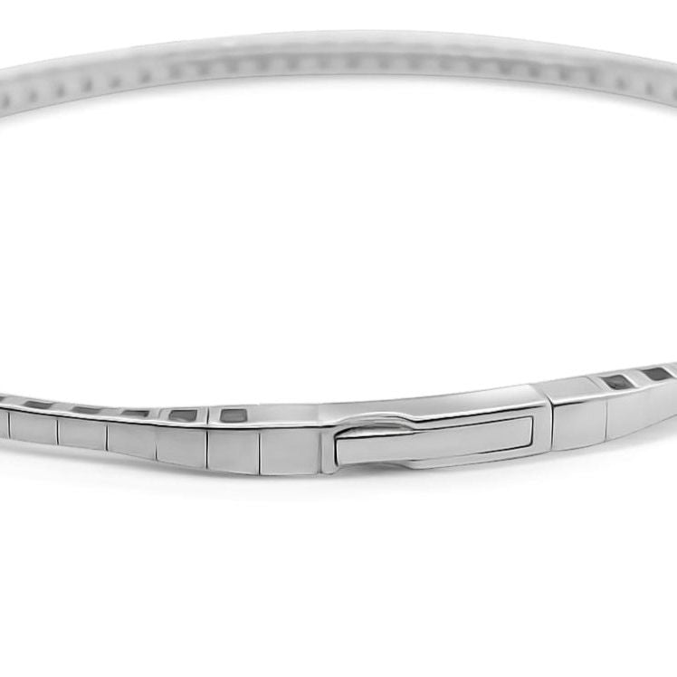 14k white gold tennis bangle bracelet with 0.55 carats of round brilliant-cut diamonds