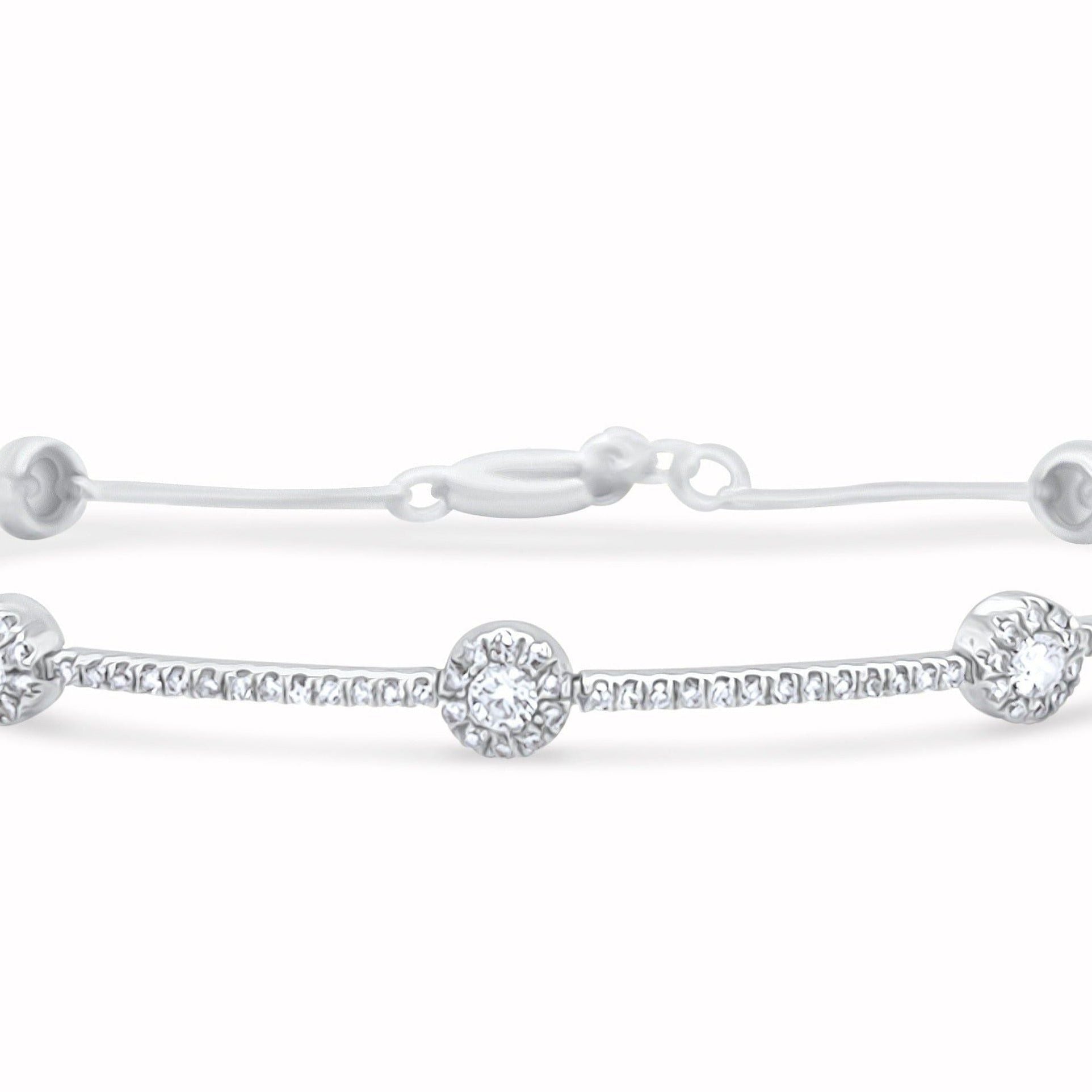 18k white gold bracelet with gold dots and round brilliant diamonds by Diamond Tales