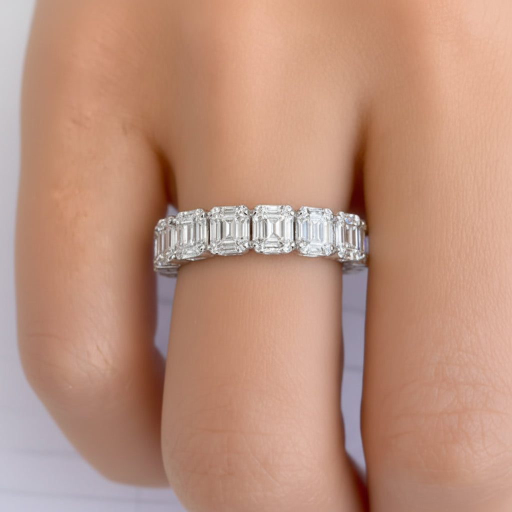 18k white gold eternity ring with emerald illusion diamond setting