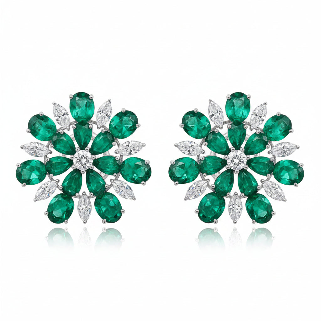 18k white gold flower earrings with emerald petals and diamond accents