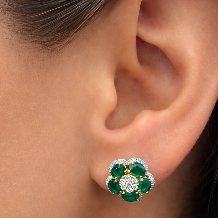 18k yellow and white gold flower earrings with emeralds and round brilliant diamonds by Diamond Tales