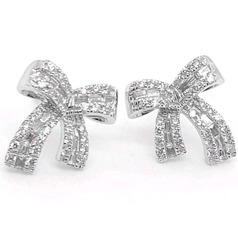 18k white gold bow stud earrings with diamond accents totaling 0.34 cts
