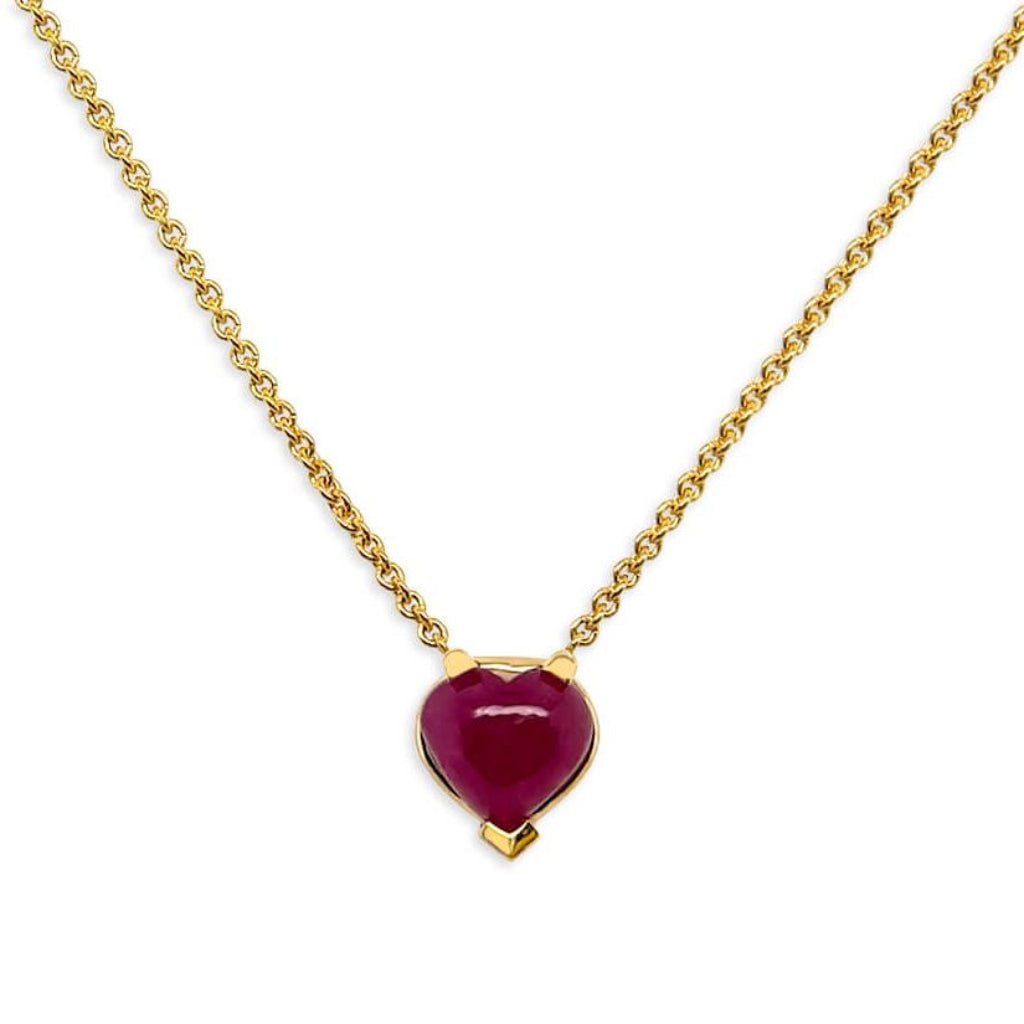 18k yellow gold necklace featuring a heart-shaped ruby cabochon pendant