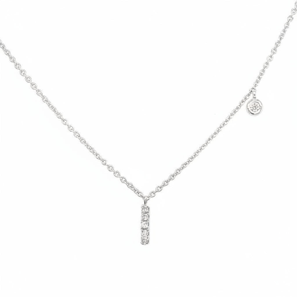 14k white gold pendant necklace featuring the letter “I” accented with diamonds