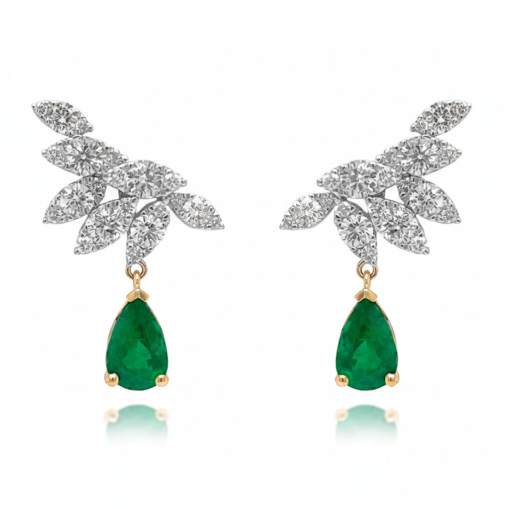18k white gold drop earrings with pear emeralds and round diamond accents