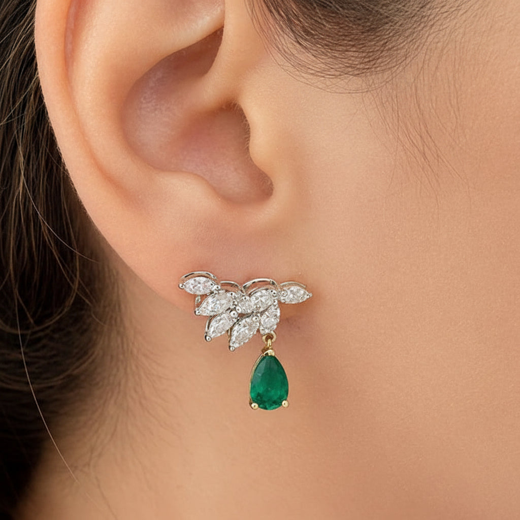 18k white gold drop earrings with pear emeralds and round diamond accents