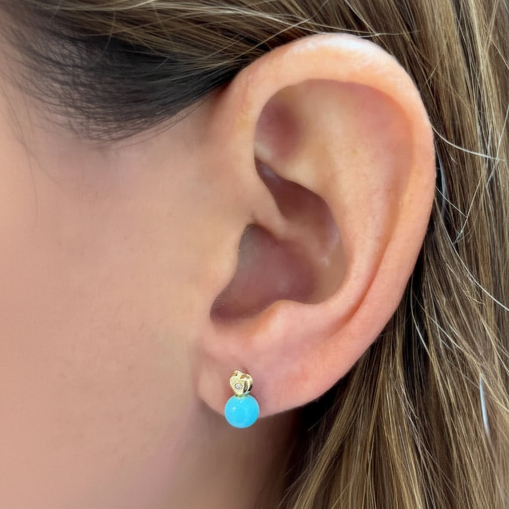 18k gold mini heart stud earrings with a small diamond drop