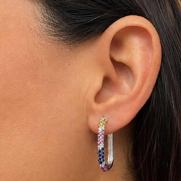 18k white gold hoop earrings with 1.66 cts multicolor round sapphires and 18 round brilliant diamonds totaling 0.29 cts