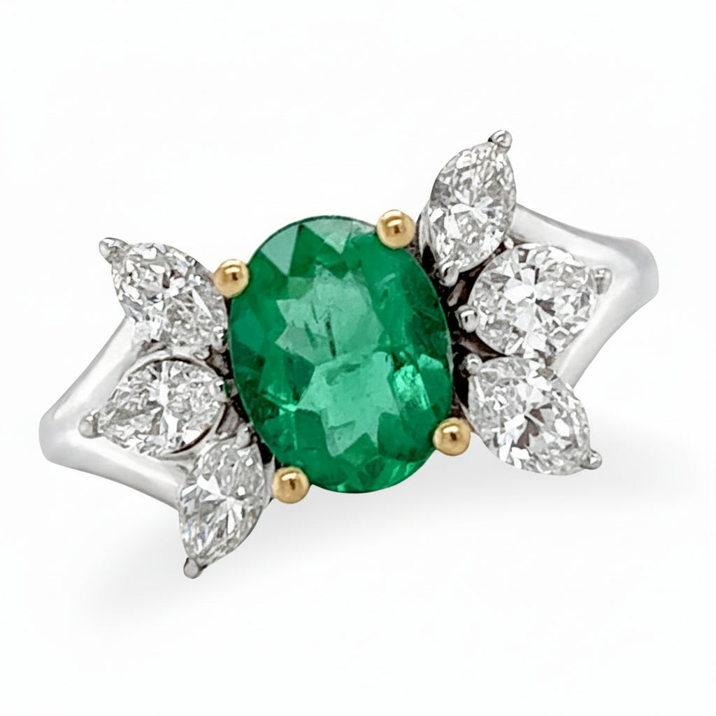 18k gold ring with oval emerald and marquise diamond side stones