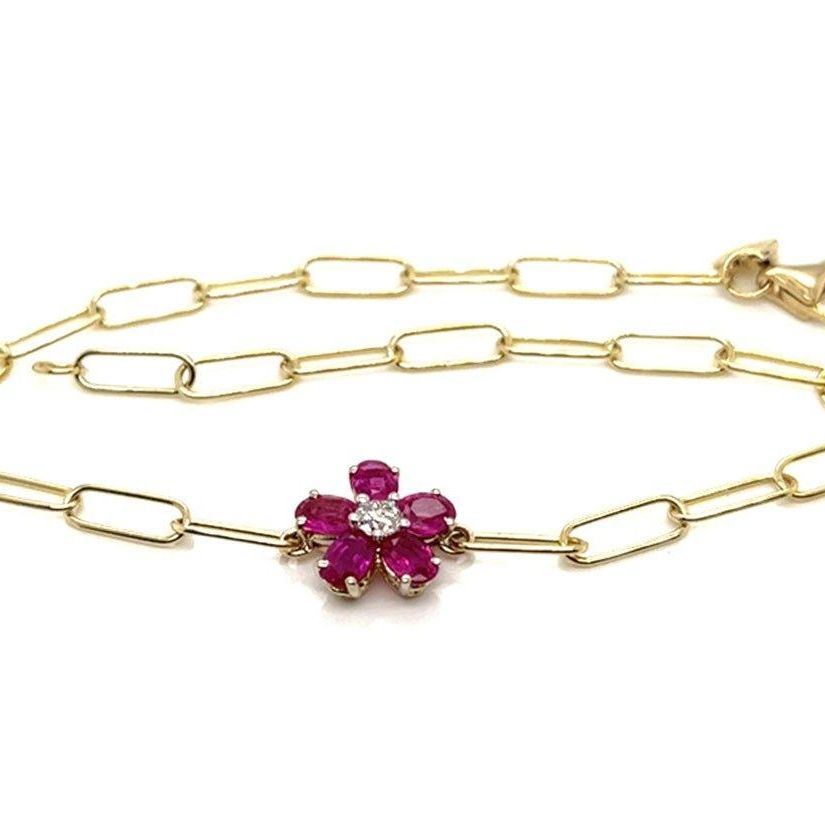 14k yellow gold paper clip chain bracelet with ruby flower center and diamond accent