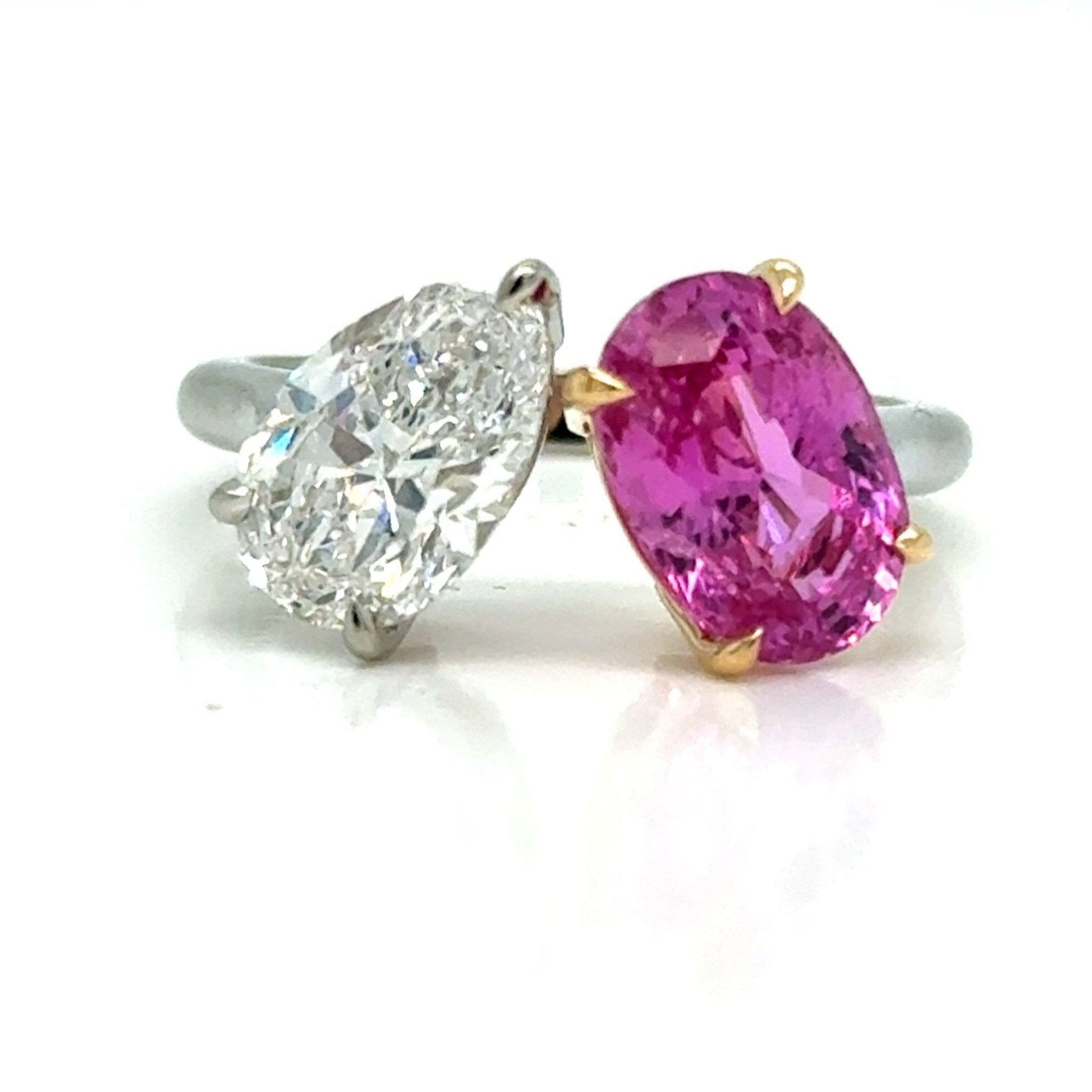 Pear diamond and oval pink sapphire ring in 18k gold