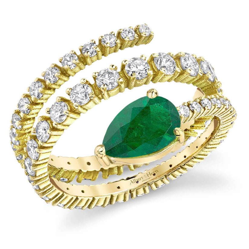 18k gold ring with a pear-shaped emerald surrounded by round diamonds