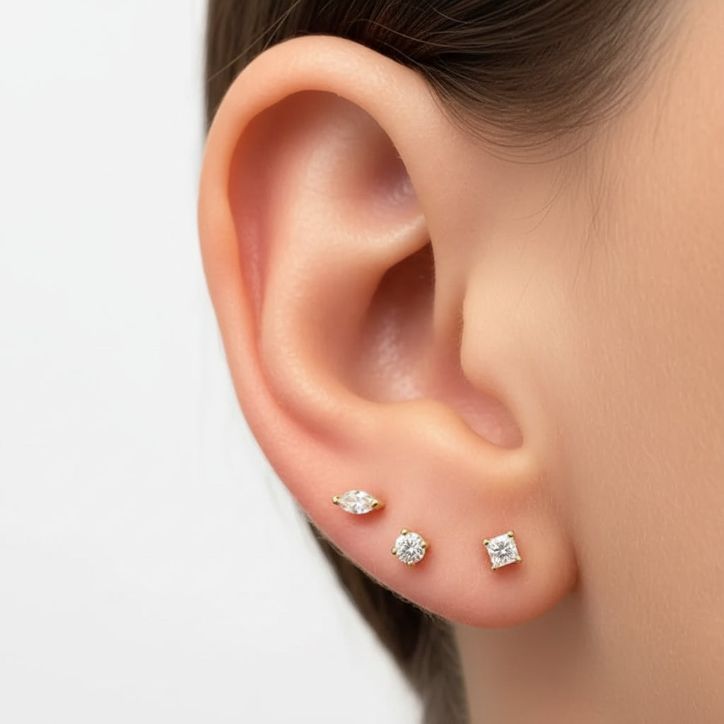 14k gold mini stud earrings with princess-cut diamonds