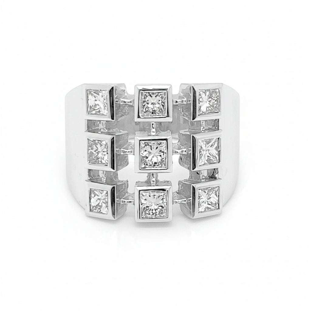 18k white gold ring with nine princess cut diamonds totaling 1.15 cts