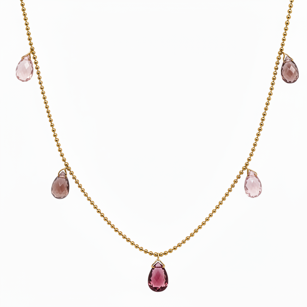 14k gold shaker necklace with five purple sapphires