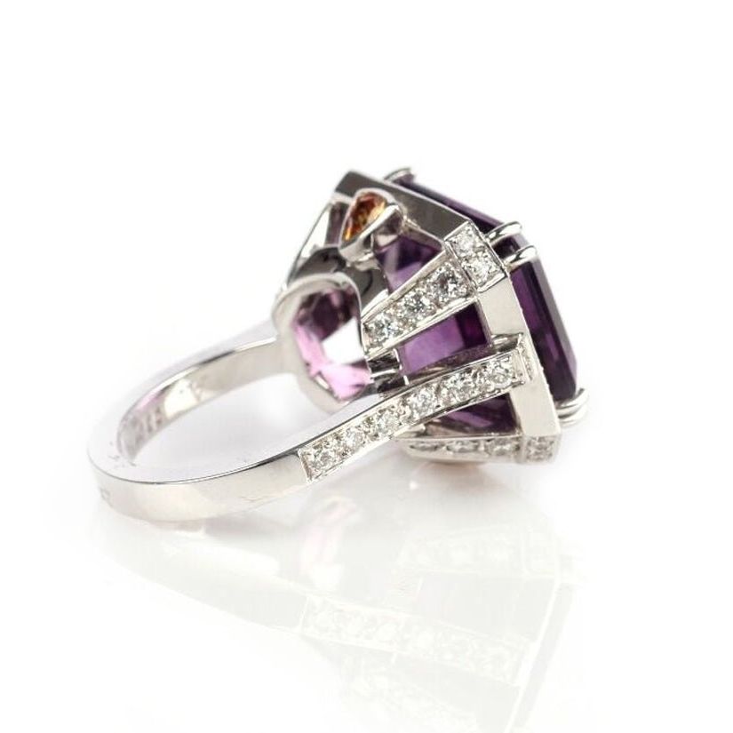 18k yellow gold ring with amethyst center and pavé orange sapphire and diamond accents