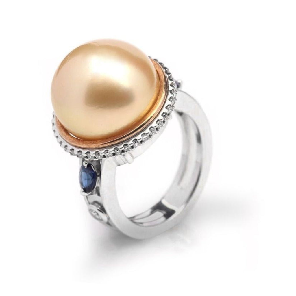 18k gold ring with South Sea golden pearl, pavé diamonds, and blue sapphire accents