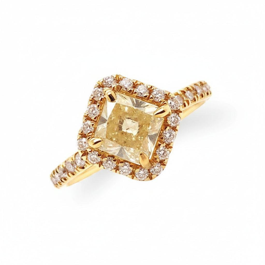 18k yellow gold ring with a rough diamond and small diamond accents