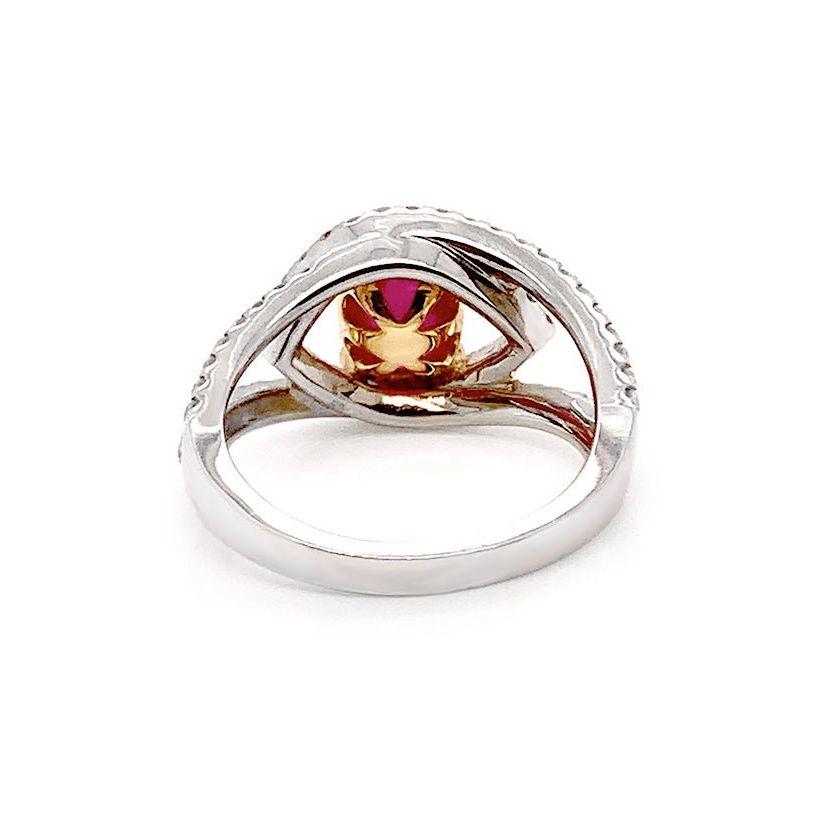18k white gold ring with ruby cabochon and diamond accents