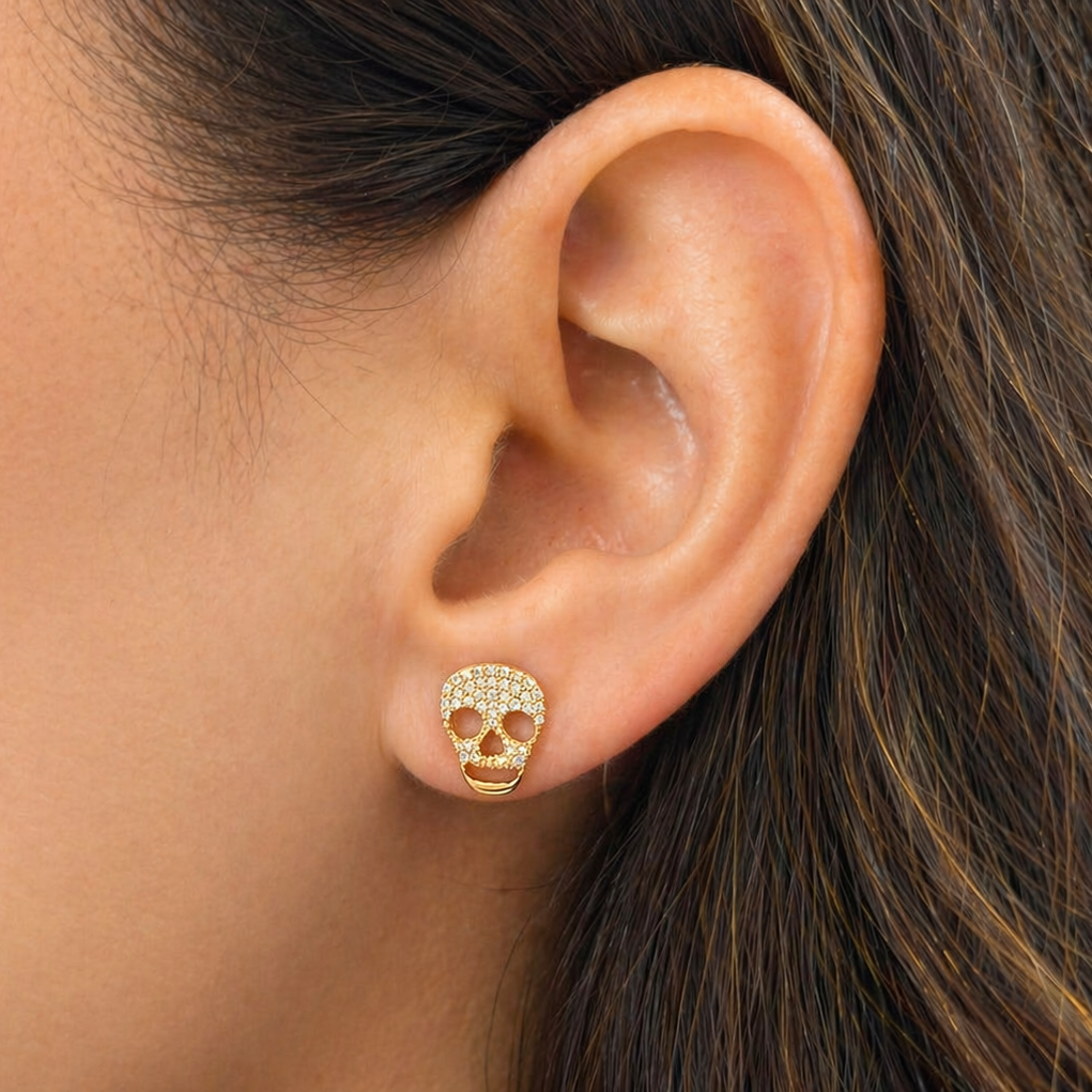 14k gold skull diamond stud earrings by Diamond Tales