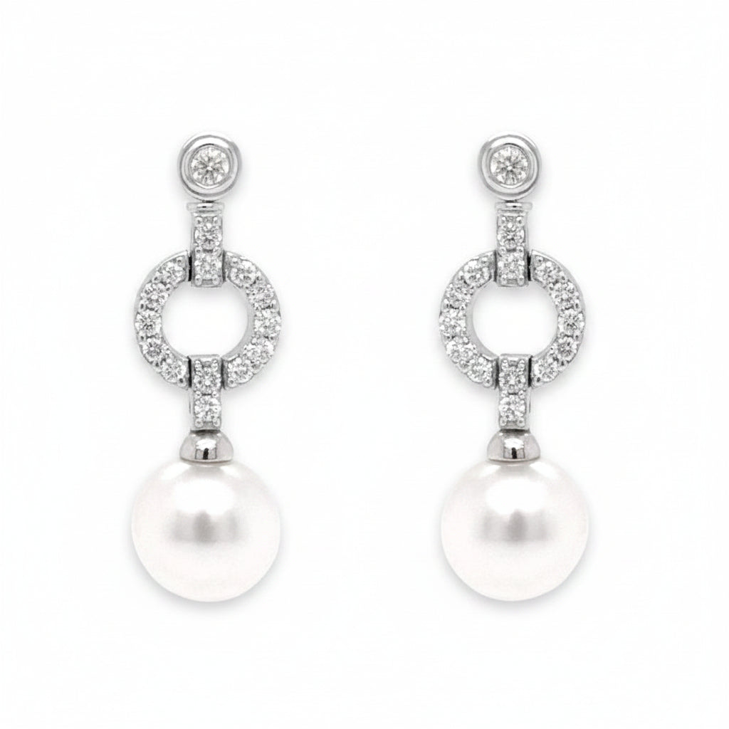 18k white gold drop earrings with large South Sea pearls and diamond accents
