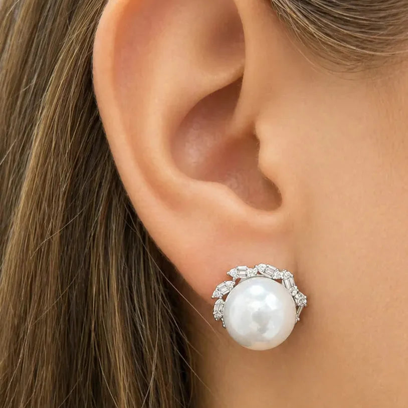 18k white gold stud earrings with South Sea pearl and diamond surrounding