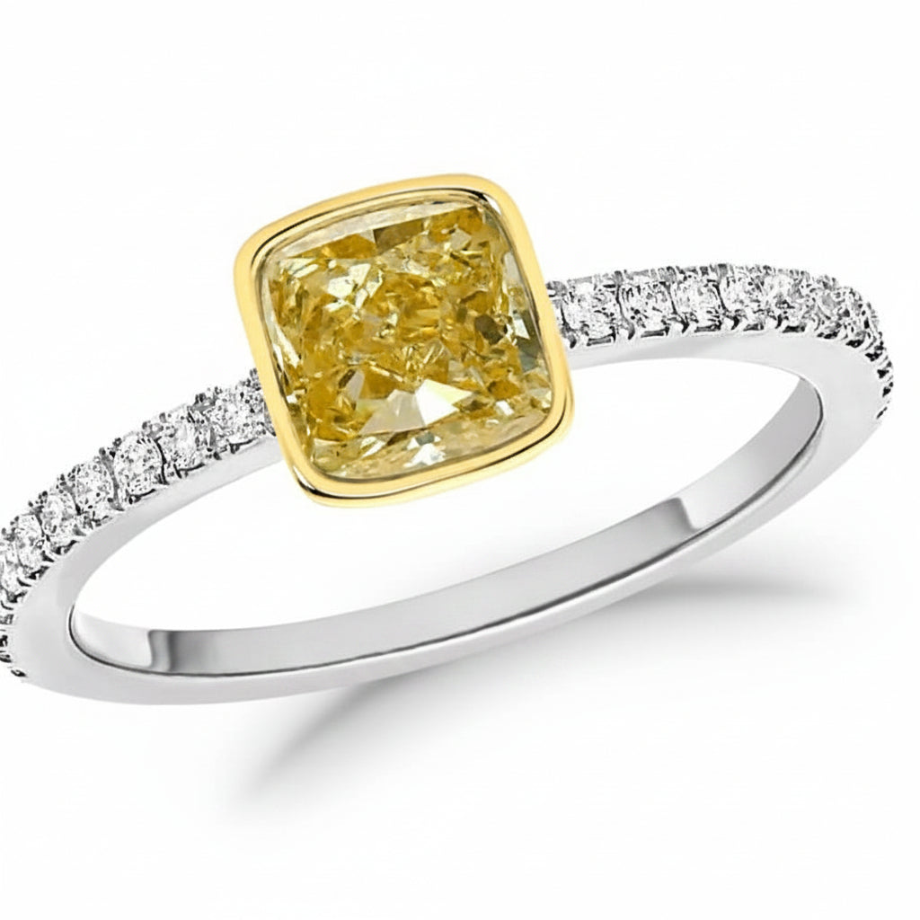 18k white gold ring with a square cut-cornered fancy yellow diamond and split-shank diamond pave