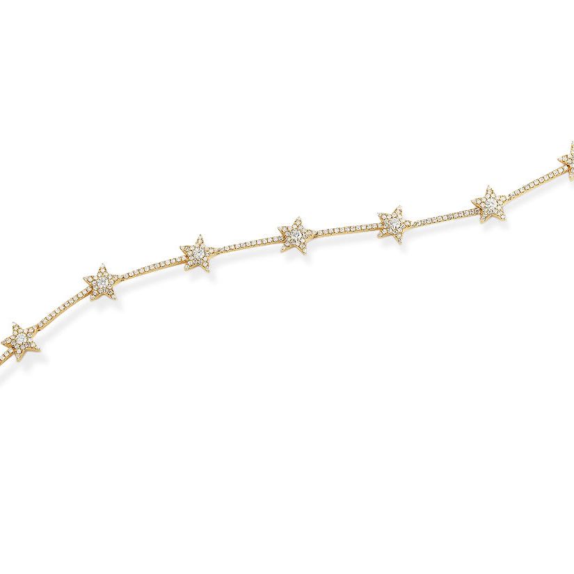 14k gold bracelet with star motifs and round brilliant diamonds by Diamond Tales