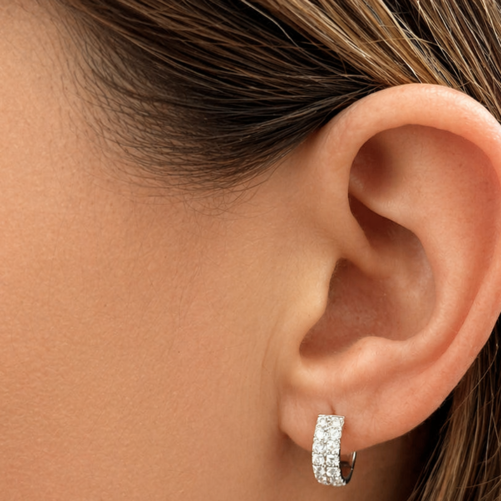 18k gold two row diamond huggie earrings by Diamond Tales
