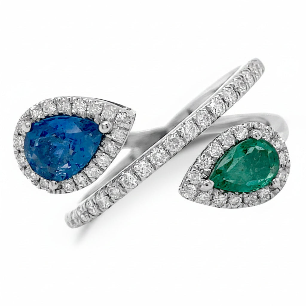 18k white gold ring with pear sapphire and pear emerald paired with diamond accents