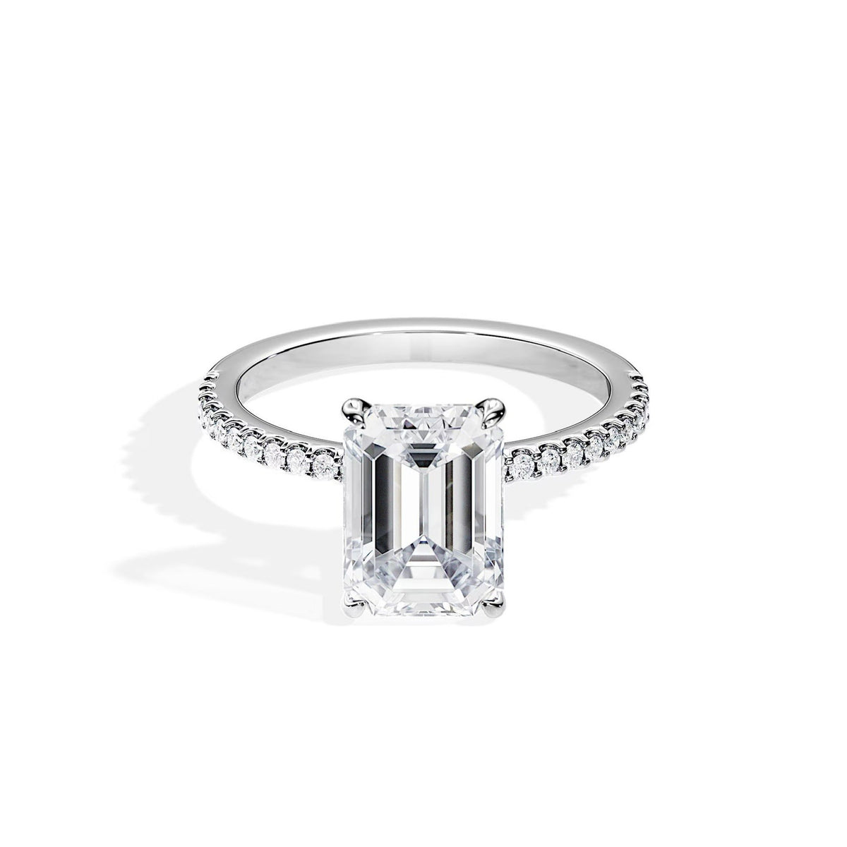 GIA graded emerald cut diamond engagement ring with a pave diamond band in white gold, Diamond Tales Miami
